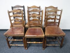 A set of six ladder back country kitchen chairs