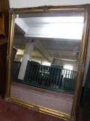 A gilt framed mirror,