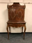 A continental inlaid Kingwood and gilt metal mounted secretaire,