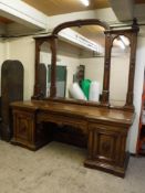An impressive late Victorian mahogany inverted breakfront mirror backed sideboard, width 256 cm.