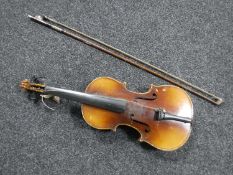 A 20th century Antonius Stradivarius copy violin with bow