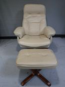 A cream leather relaxer swivel chair with stool