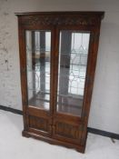 An Old Charm linen fold bookcase