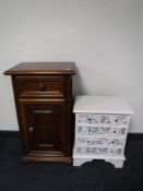 A mahogany pot cupboard and a painted four drawer chest with glass handles