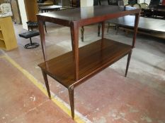 Two rectangular coffee tables CONDITION REPORT: The rosewood table is veneered.