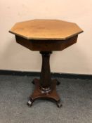 A 19th century octagonal mahogany work table,