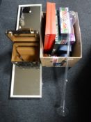 A box containing assorted board games including deluxe edition Monopoly, Monte Carl Roulette,