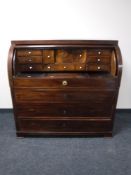 A 19th century mahogany cylinder fronted bureau