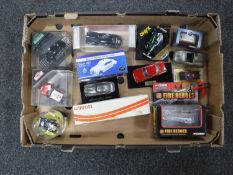 A box of mixed vehicles including Dunlop mini remote controlled car