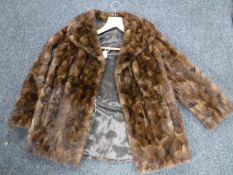 A vintage dark brown mink jacket