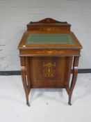 A Victorian inlaid rosewood Davenport