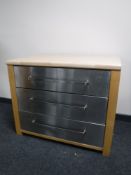 An Ikea kitchen three drawer chest with metal fronts