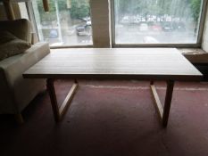 A pair of blonde oak square lamp tables and a pine coffee table