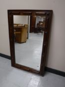 An oak framed mirror