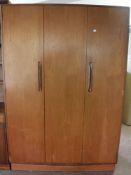 A teak G Plan triple door wardrobe