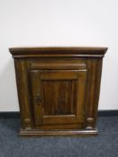 A late 19th century pine wall cabinet
