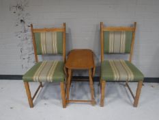 A pair of blonde oak dining chairs and drop leaf table