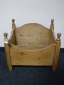 A stripped pine mag rack