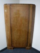 A mahogany corner cupboard