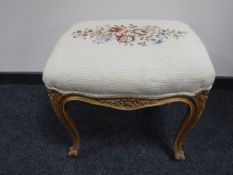 A French walnut tapestry upholstered stool