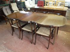 A late 20th century eight piece dining room suite