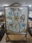 A tapestry fire screen