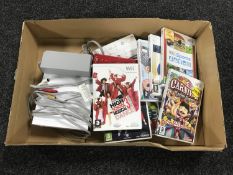 A Nintendo Wii console with games,