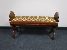 An oak duet piano stool