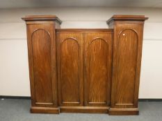 A Victorian mahogany sentry door inverted break-front wardrobe, width 233 cm,