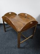 A mahogany butler's tray on stand