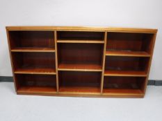 A set of mid 20th century open bookshelves