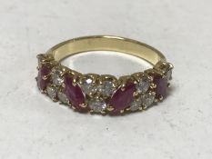 An 18ct gold ruby and diamond ring