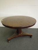 An early Victorian mahogany breakfast table