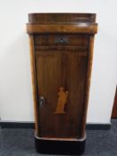 A late 19th century inlaid mahogany sentry door cabinet
