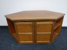 A 20th century teak Nathan corner TV stand