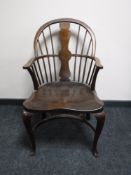 A 20th century oak Windsor armchair