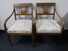 Two inlaid mahogany scroll arm armchairs