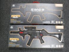 Two boxed of regimental Police SMG 9 electric water capsule rifle