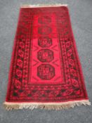 A bokhara design rug,