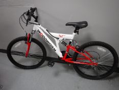 A Woodworm GXI full suspension boy's mountain bike