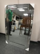 An all glass contemporary mirror,