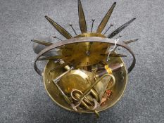 A copper jam pan, assorted meat hooks, brass car horn, sun burst mirror,