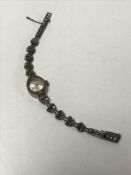 A sterling silver Dorly 17 jewel cocktail watch