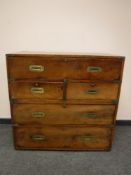 A 19th century mahogany military style secretaire four drawer chest,