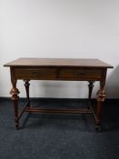 A late 19th century mahogany writing desk fitted two drawers