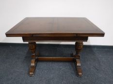 An oak pull out dining table