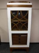 A continental glazed cabinet fitted with five drawers, width 72 cm.