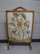 A tapestry fire screen