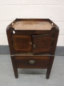 A Georgian inlaid mahogany step commode