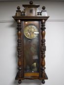 A mahogany cased Vienna wall clock